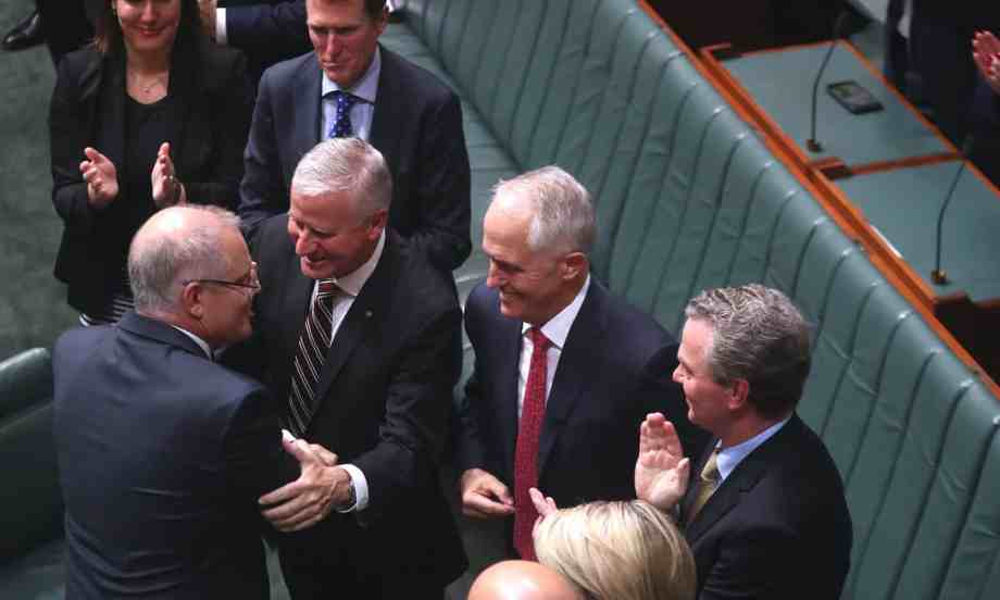 scott morrison being congratulated on budget - why