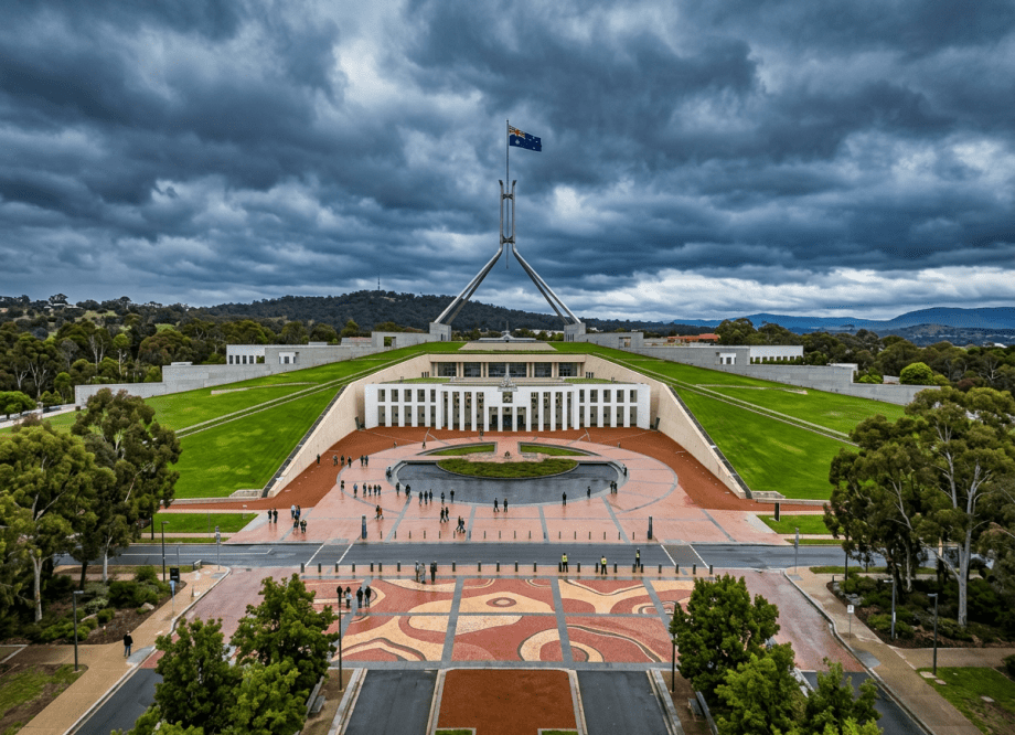 Australian Parliament House exterior under overcast sky, Canberra.